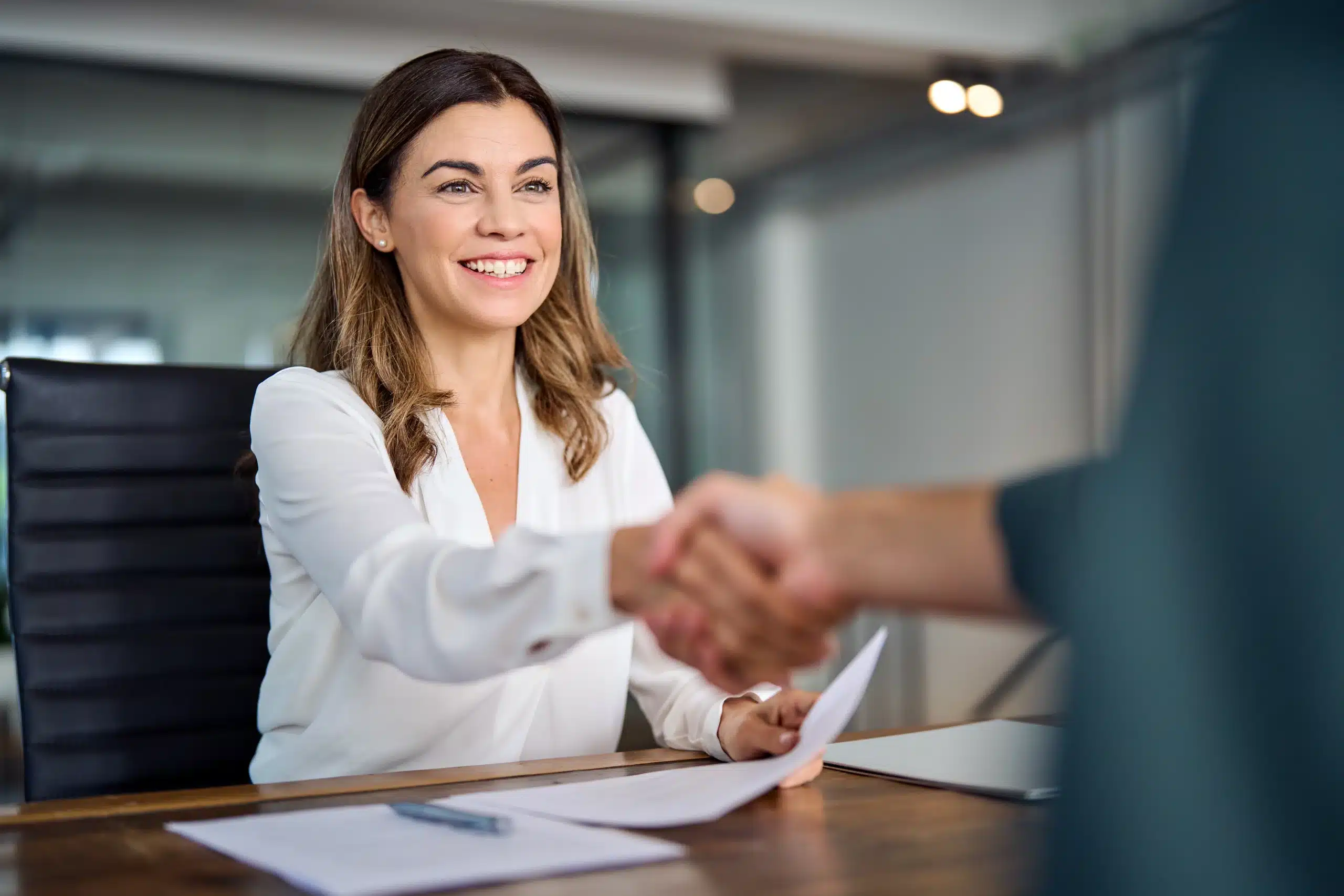 lawyer making handshake contract deal with client