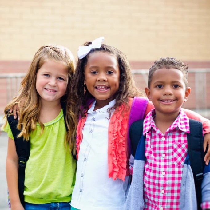 children gathered for back to school community event