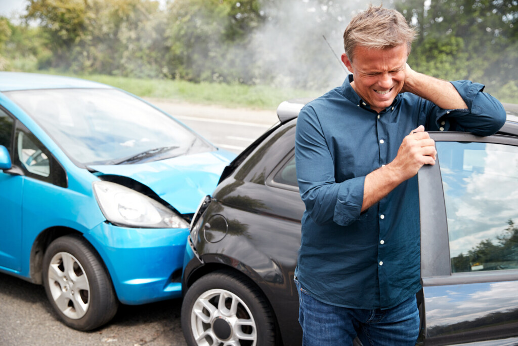 man handling an accident with an uninsured driver