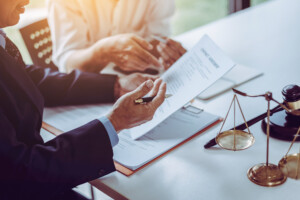 lawyer explaining policy limits for personal injury claim