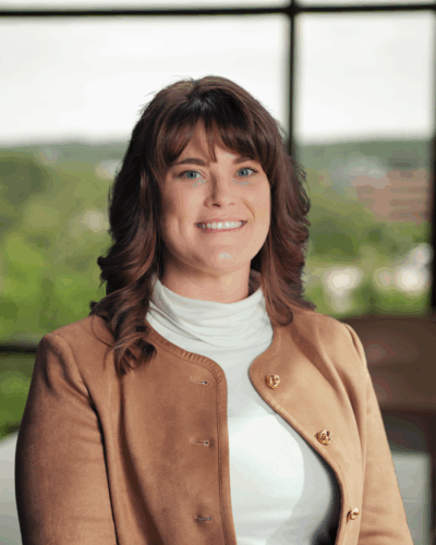 Professional headshot of Brooke Graham, a pre-litigation personal injury attorney in Birmingham, wearing professional attire against a neutral background.