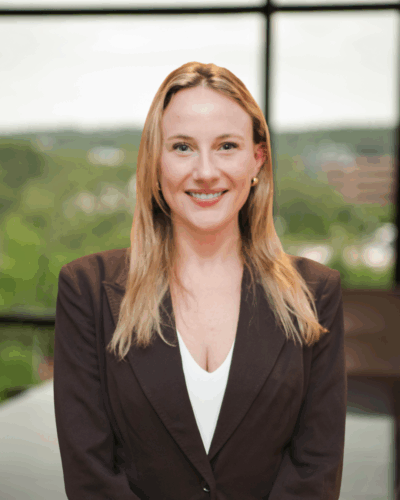 Portrait of Elizabeth Phillips, a litigation attorney serving Tennessee and Georgia, wearing professional attire against a neutral background.