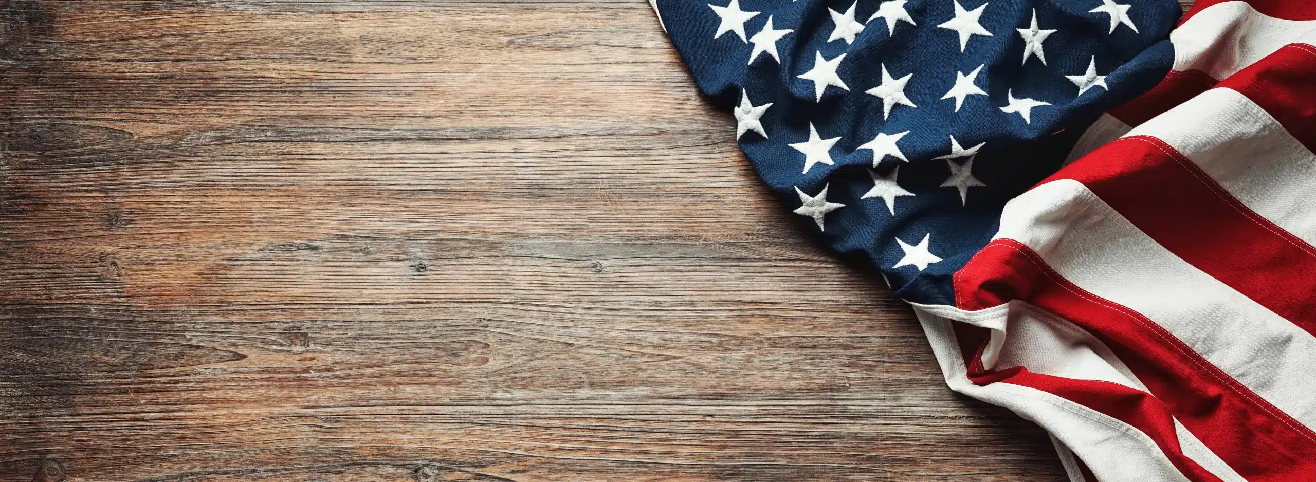 American flag on a wooden background veterans benefits lawyers