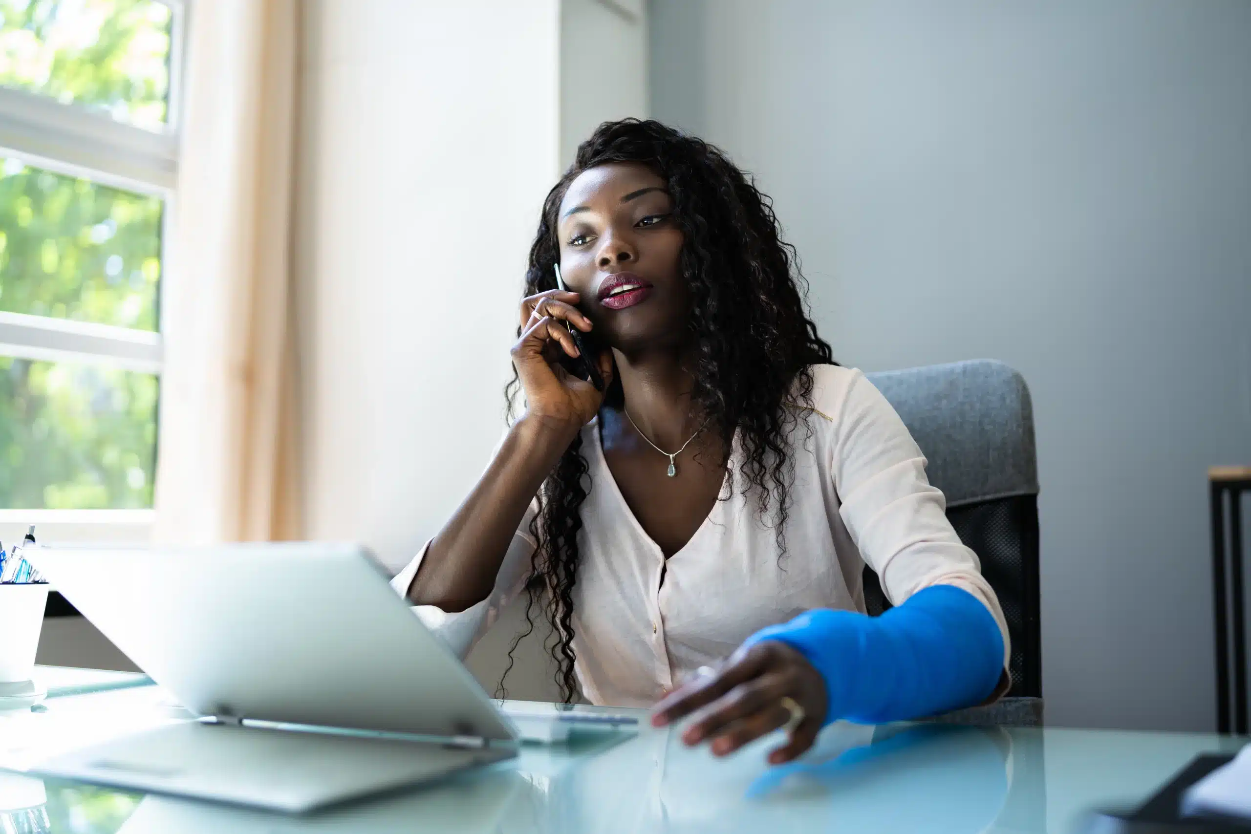 woman with personal injury claim filing paperwork