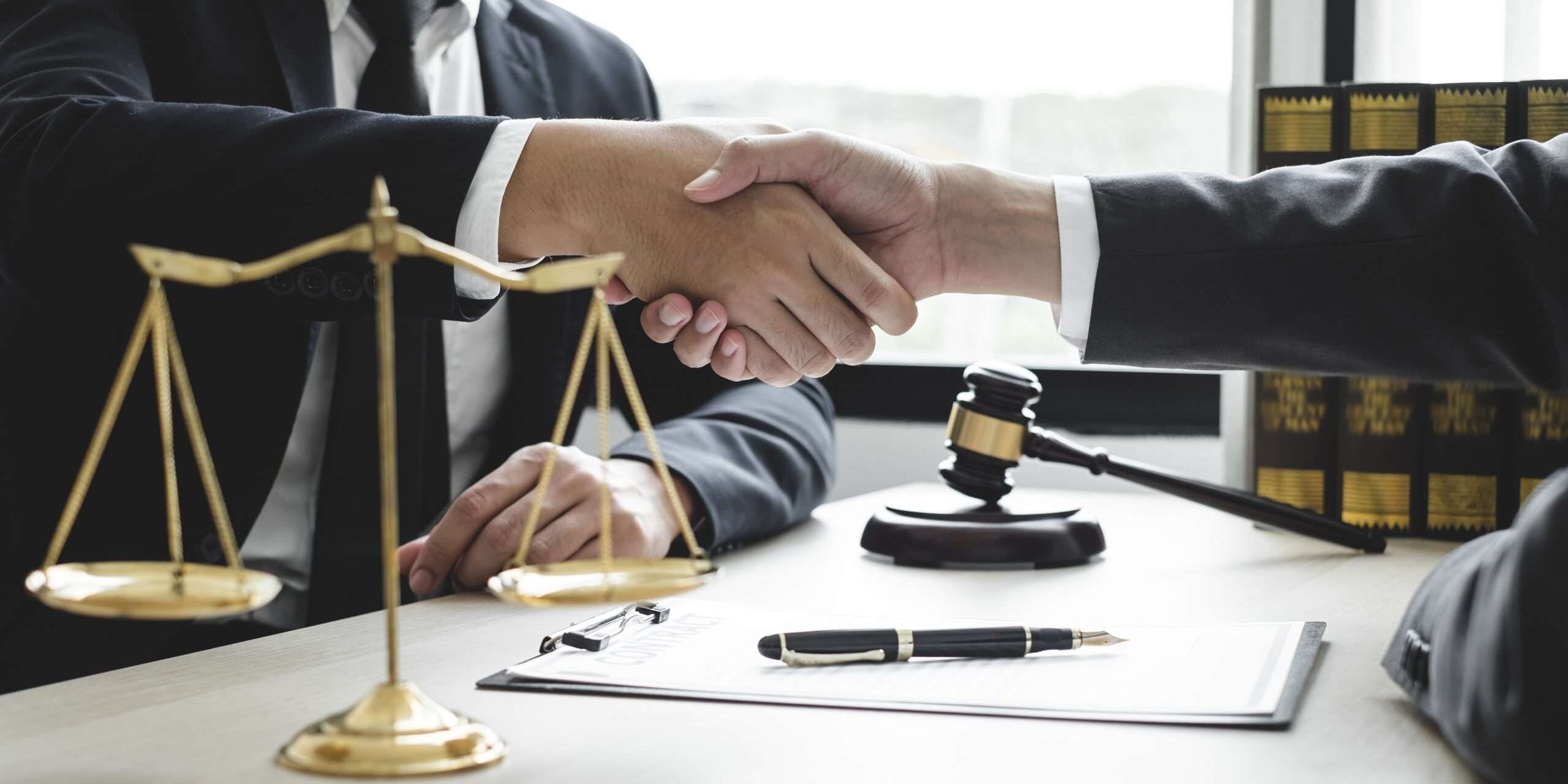 shaking hands with personal injury car accident lawyer