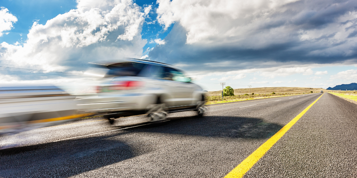 Summer driving fast on dangerous road