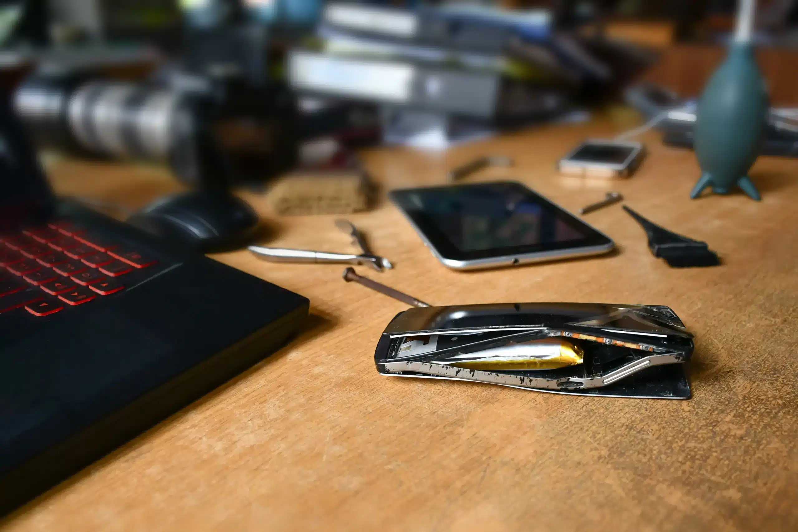 Swollen battery of mobile phone and possibly burst