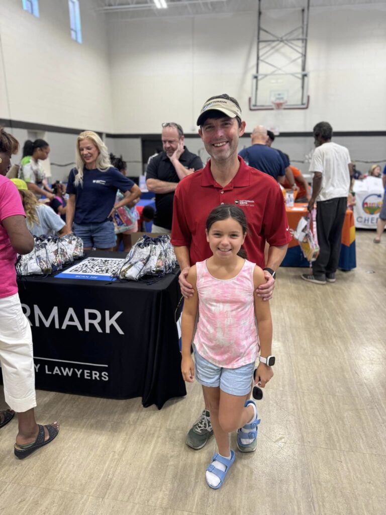 Wettermark Keith Injury Lawyers at Community Event Wettermark Keith Attorney Booth Samuels with his daughter at a local Birmingham AL community resource fair