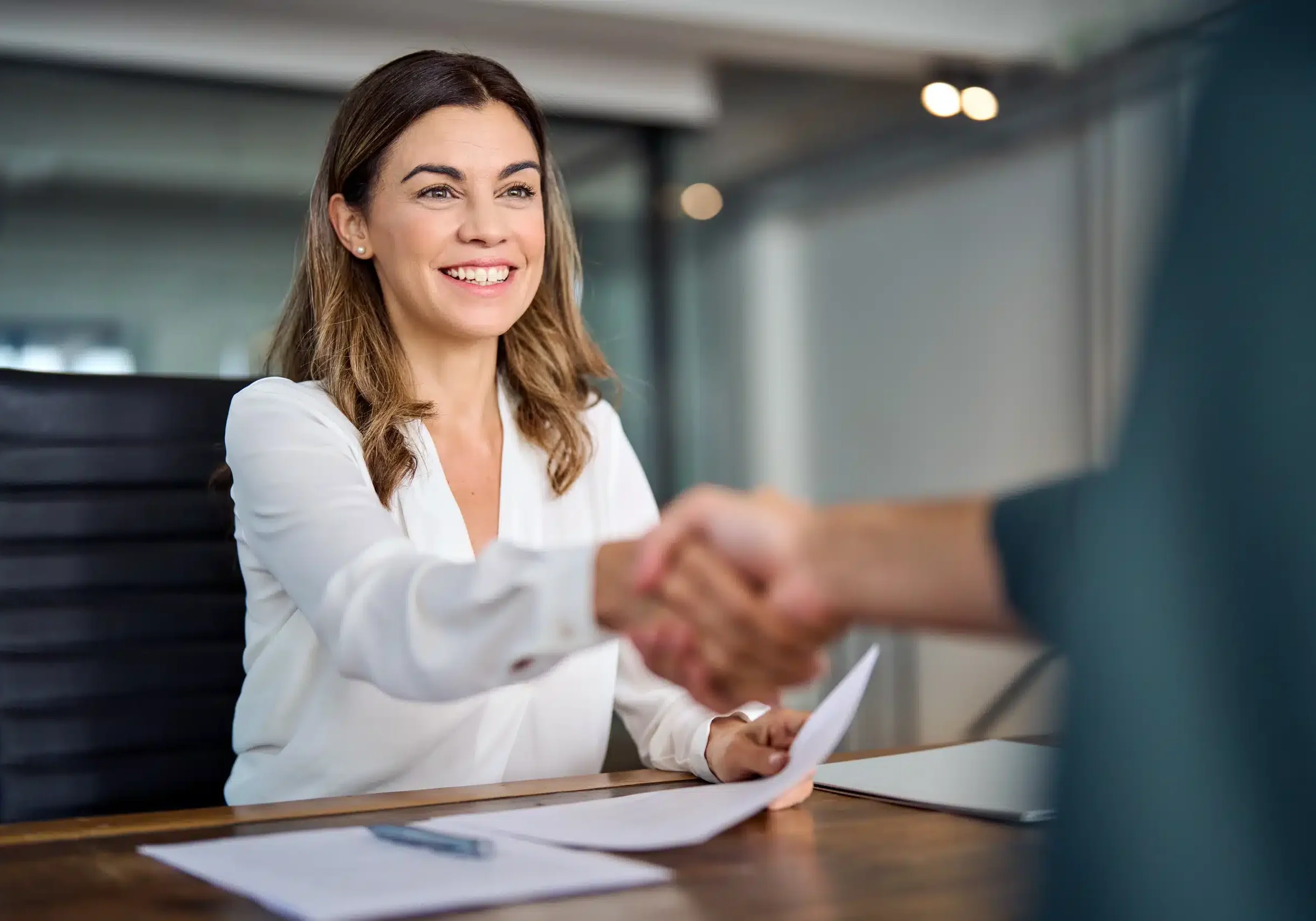 lawyer making handshake contract deal with client